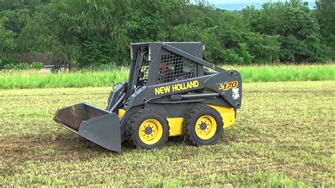 how to remove battery from new holland l170 skid steer|new holland battery replacement.